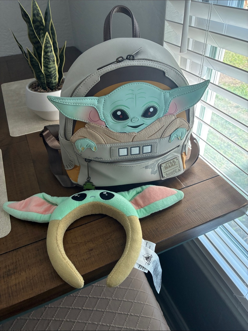 Loungefly The Child (Grogu) Mini Backpack in Mint Green and Tan and grogu ears.